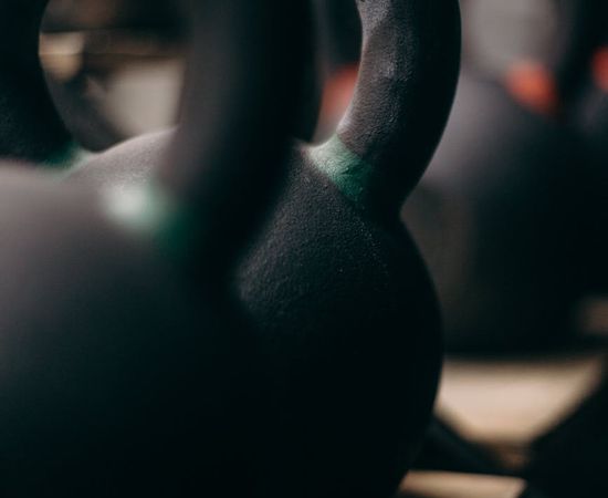 Minimalist training equipment on a dark reflective surface
